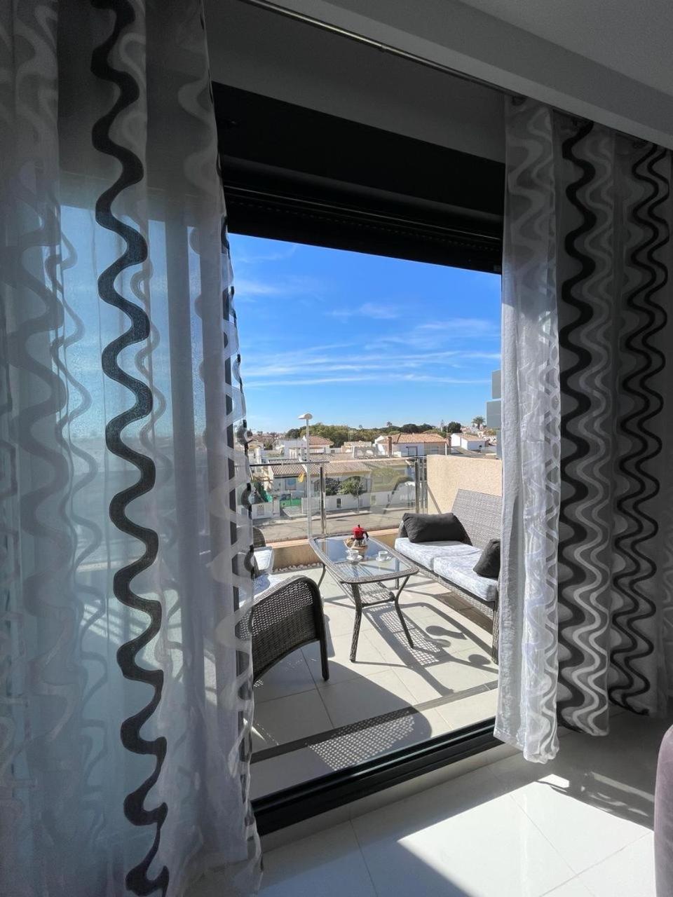 Elisa Bay Apartment Mil Palmeras Torre de la Horadada ภายนอก รูปภาพ